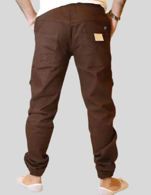 Brown cargo pants on a plain background